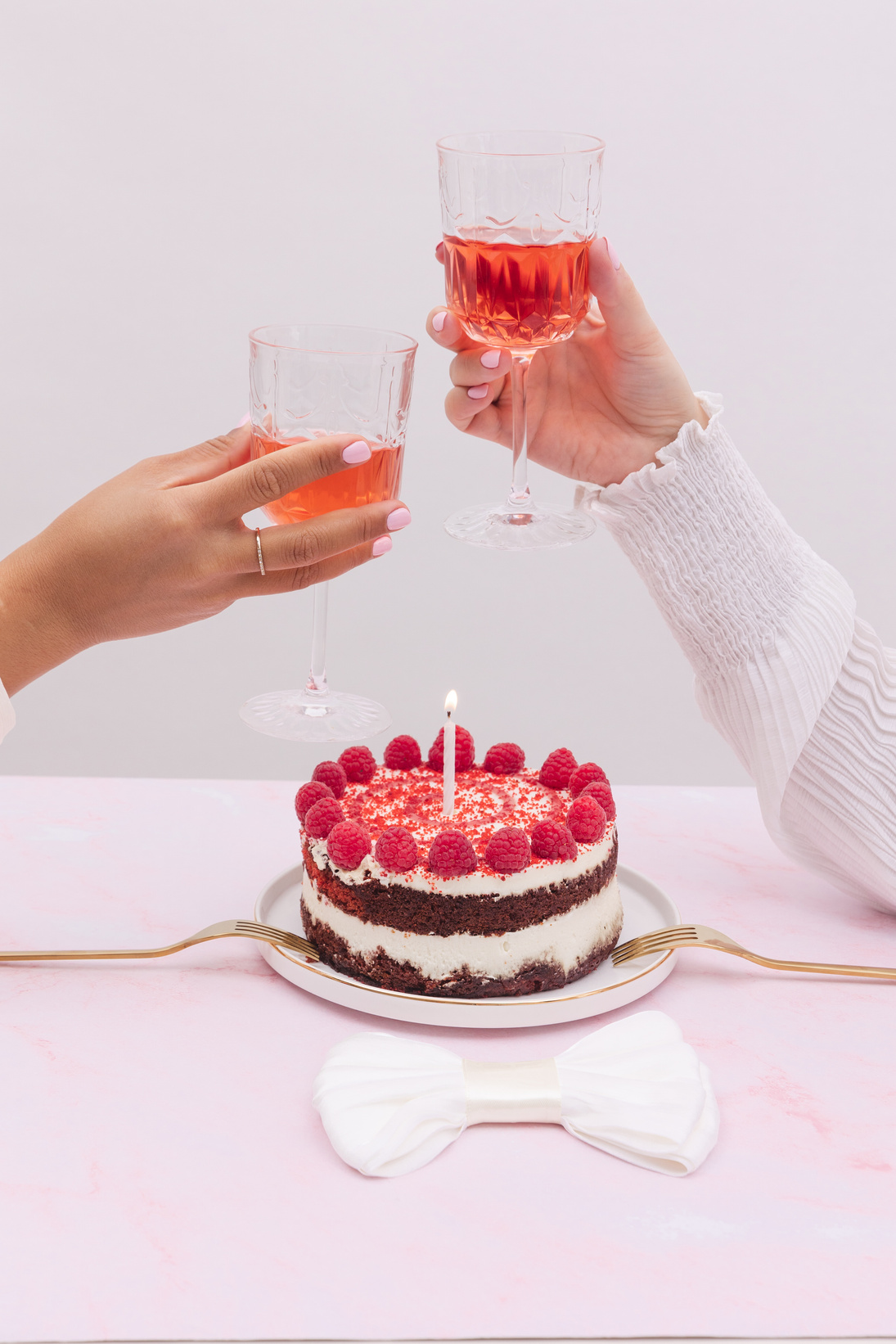 Women Celebrating with Cake